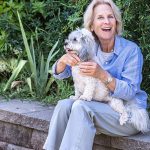 Portrait of Jill Mathews and her dog