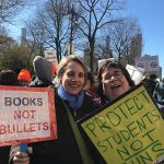 SAGE Supporters Victoria Watkins and wife Carol Garcia and gun violence march